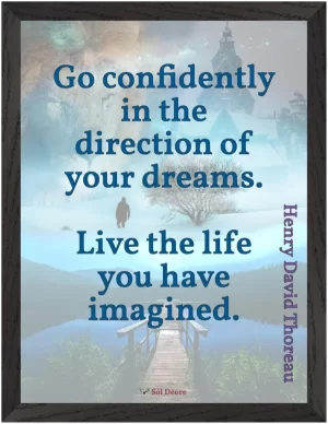 A black framed print with a quote by Thoreau, 'Go confidently in the direction of your dreams. Live the life you have imagined.'